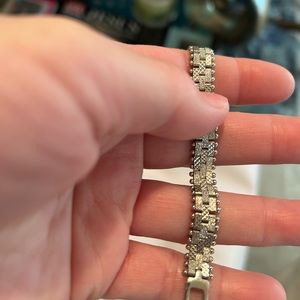 Lia Sophia silver coated, 8 inch clasp bracelet.